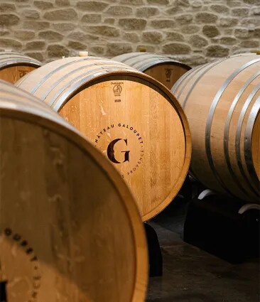 Organic rosé wine ageing in oak barrels in the cellars of Château Galoupet Cru Classé Côtes de Provence.